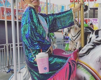 Petrol Sequin Tassel Kimono made with two tone sequins, neon UV active tassel fringe and Rainbow Pom Poms! For festivals and parties