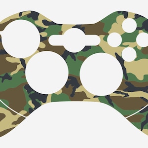 May include: Camouflage patterned skin for a gaming controller. The skin features a green, brown, and black camouflage pattern.
