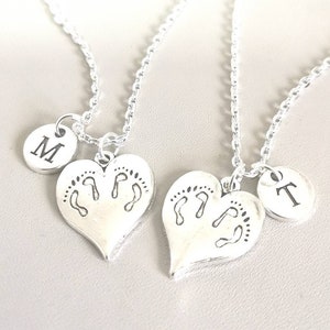 Matching twin hot sale necklaces
