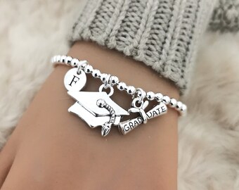 カチューシャ・被り物・帽子 Universal Studios Pewter Charm Bracelet il_fullxfull.6298931941_j08q.jpg