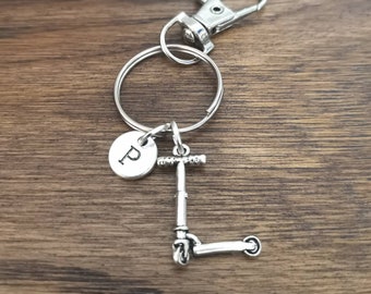 Scooterpresent, Scooternyckelring, Scooternyckelring, skaterpresent, Scooterpojke, Skater, Barncykel, Moped, Motorcykel, Barnscooter, Vän