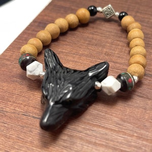 Black obsidian sandalwood wolf spirit animal bracelet for protection, courage, confidence