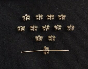 Vintage, small, puffed, two sided, antique silver butterfly bead, acrylic with silver plating, made in USA, 5mmX8mm Qty. 12 CF33