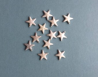 Vintage bright silver plated puffed star. Made in USA, 20 x 20mm Qty. 12 CC31