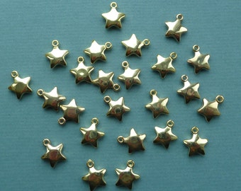 Vintage bright gold plated puffed star charm. Made in USA, 13  x 16mm, Qty. 24 CC27