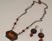 Wild Wild West Necklace Vintage French brass locomotive, Steampunk double chain, Smokey Quartz, copper pearls, matching earrings.