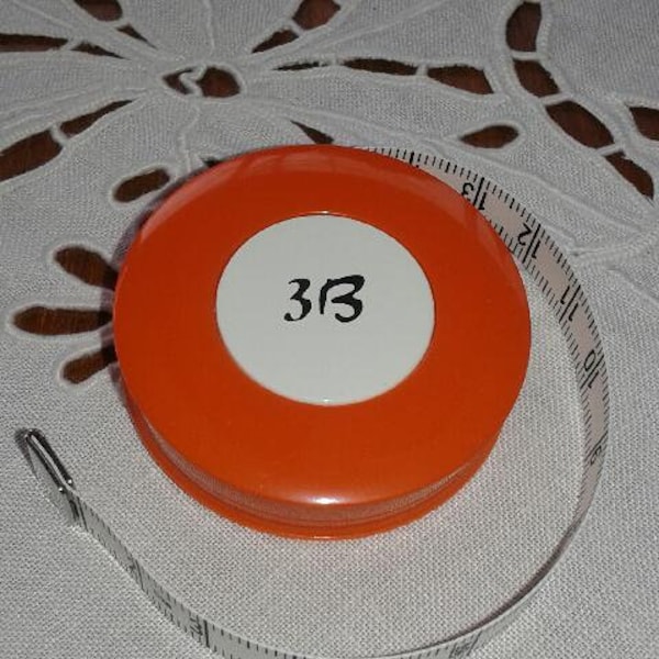 Centimètre rollfix(mètre enrouleur)orange
