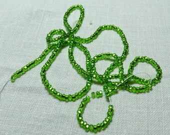 Seed beads (10) chartreuse s/silver diamond