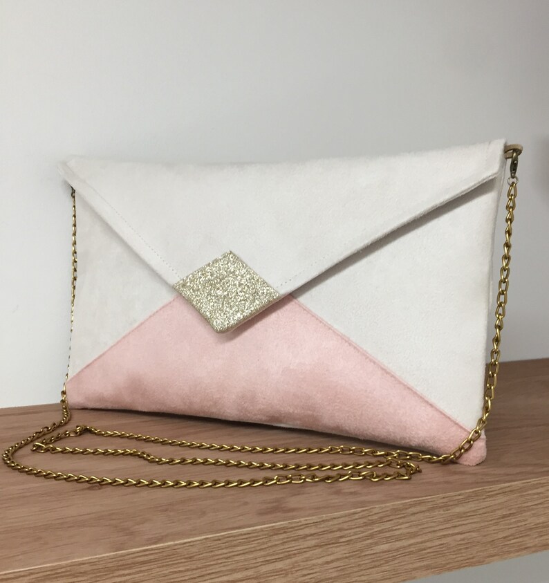 pink and gold clutch bag