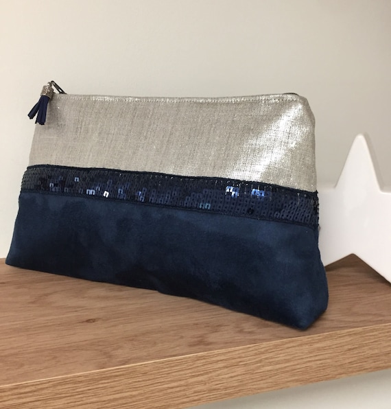 navy and silver clutch bag