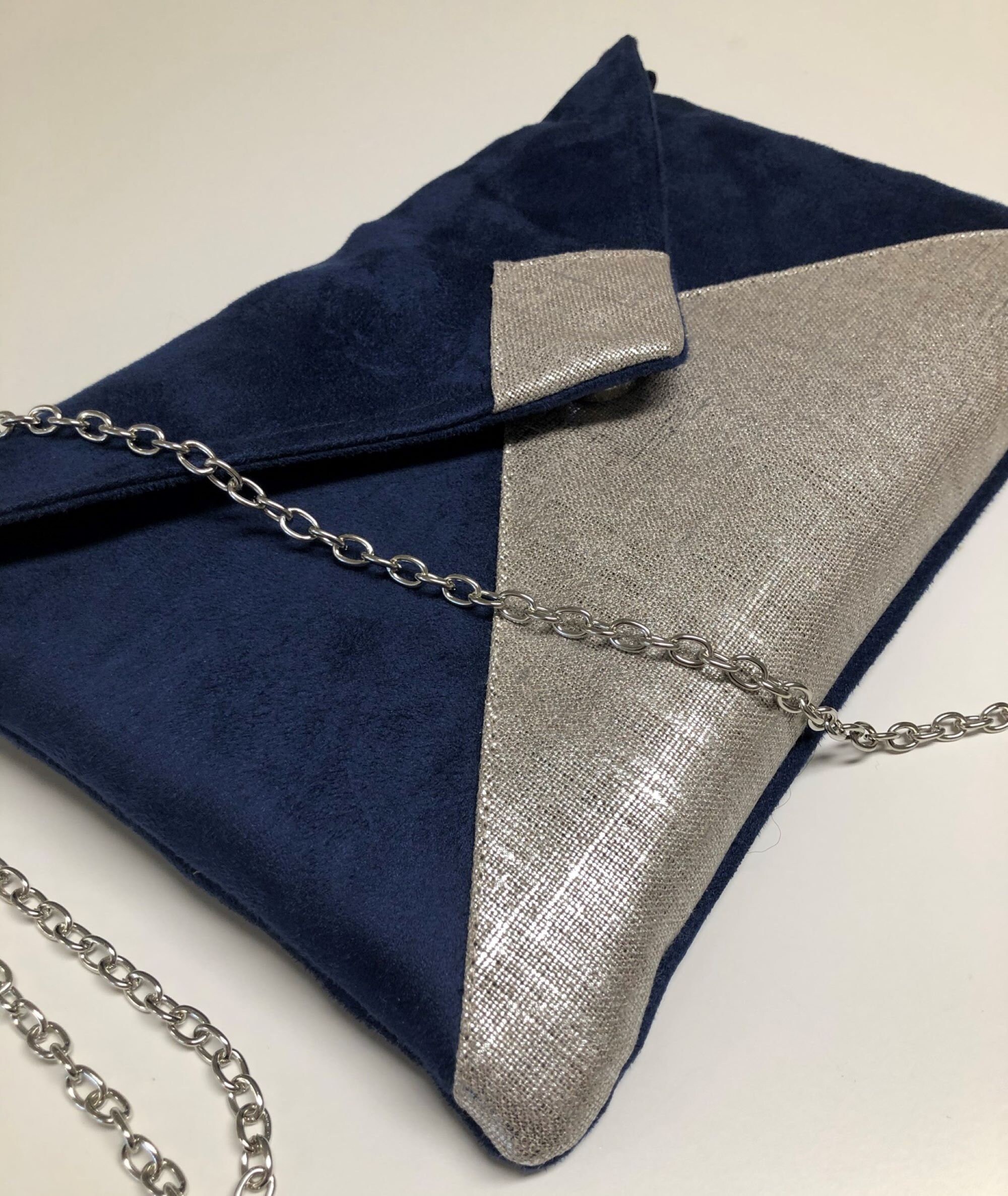 Navy and store silver bag