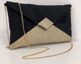 Black and gold hotsell clutch bag uk