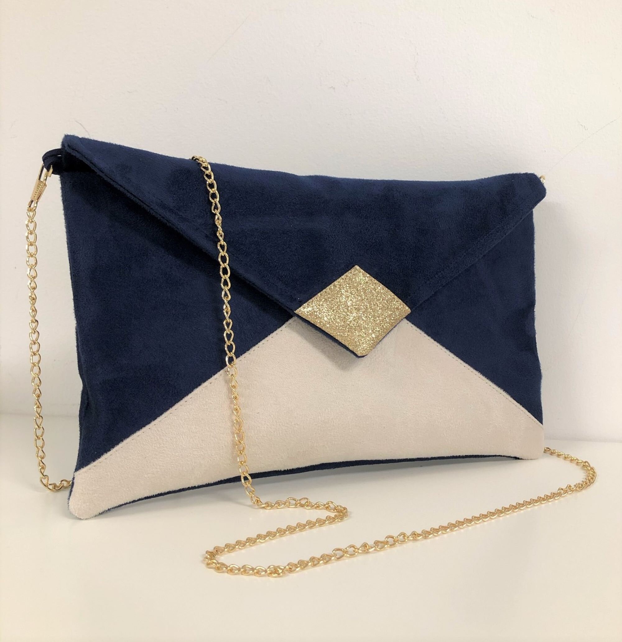 Navy and mustard clutch bag sale