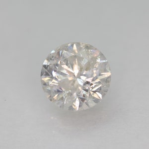 Earth Mined Diamond, .61cwt, 5.2x5.2x3.4 Clarity Enhanced. See Video. Retiring, must sell.