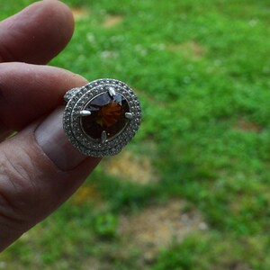 Size 8  Ring,  Imperial Topaz  8.83cwt. 14x10.7mm. Earth Mined . Independent Master Valuer Appraised: 1290.00. Gift of Love