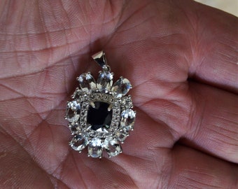Blue Sapphire Pendant. A 2.21 cwt Blue Sapphire. Appraised for 950.00US. September Birthstone. Retiring, must sell.