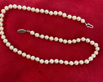 PEARLS RESTRUNG