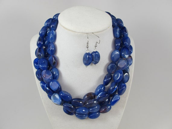 Navy blue statement best sale necklace
