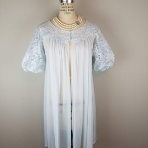 Vestido babydoll vintage de renda azul-claro dos anos 1950 com fecho frontal, tamanho 10