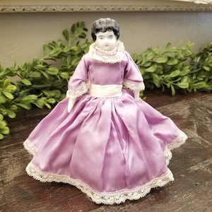 Antique German China Head Doll 7&quot; Black Hair Cloth Body Lavender Silk Dress