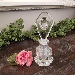 Vintage Crystal Perfume Bottle with Tall Stopper and Etched Flower