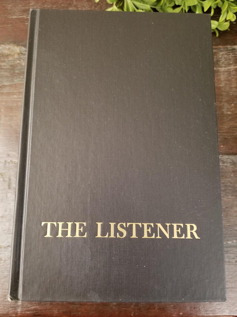 May include: A black hardcover book with the title "THE LISTENER" printed in gold lettering on the front cover.