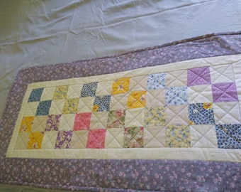 Pastel table runner with purple border