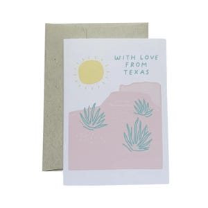 May include: A pink and white greeting card with a sun, cacti, and the text "With love from Texas".