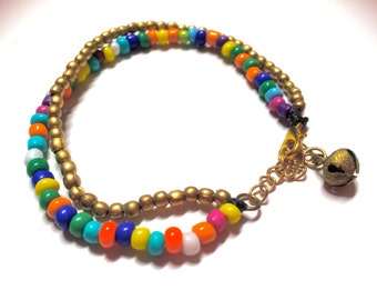 Multicolor Adjustable Beads Bracelet. Comes in 2 layers and a bell. Very classy!!