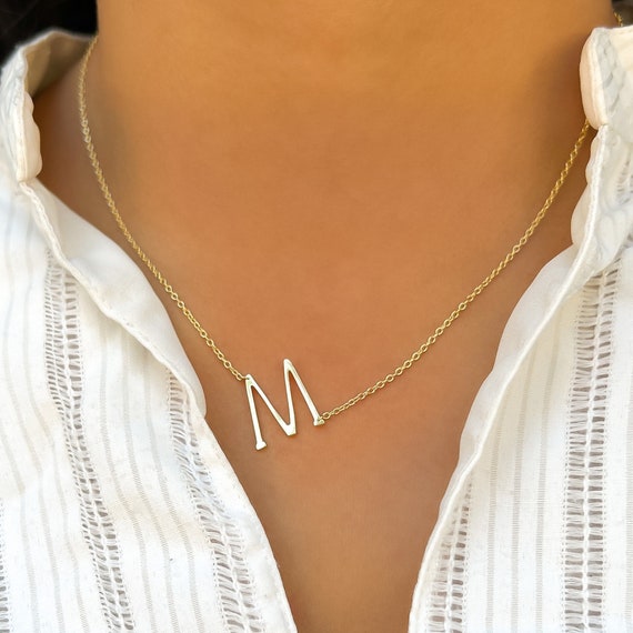 Buy Gold Plated M - Initial Pendant Necklace by MNSH Online at Aza Fashions.