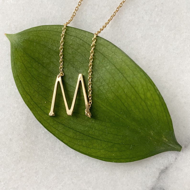 M sideways necklace Clearance