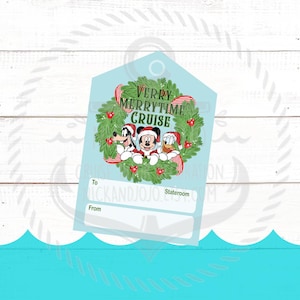 May include: A light blue gift tag with a Christmas wreath design and the text "Verry Merrytime Cruise." The tag features cartoon characters Mickey Mouse, Goofy, and Donald Duck in Santa hats. Includes spaces for "To" and "From."