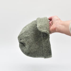 Beanie with adjustable neck flap handknitted in alpaca blend yarn