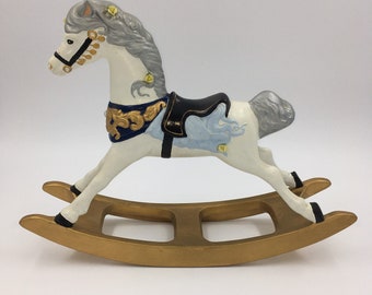 1989 Hand painted ceramic rocking horse, gold with blue, signed Goldie Morris, 16.5" long x 13" high