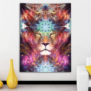 May include: A colourful tapestry depicting a lion's face at the centre, set against a psychedelic background. The artwork uses red, purple, blue, and gold hues, creating a mystical and spiritual feel. The rectangular tapestry is designed for wall decoration.