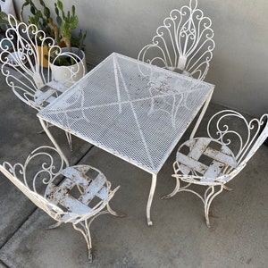 Vintage patio set with four peacock chairs & table mid century, Italian