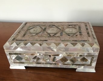 Vintage carved mother of pearl table box jewelry box with key.