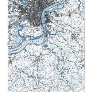 May include: A vintage map of Philadelphia, Pennsylvania and New Jersey, showing the Delaware River and surrounding areas. The map is in blue and white and includes the text "PENNSYLVANIA-NEW JERSEY PHILADELPHIA QUADRANGLE".