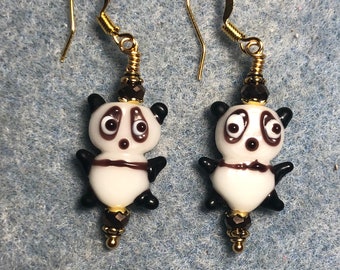 Brown and white lamp work panda bear bead earrings adorned with brown Chinese crystal beads.