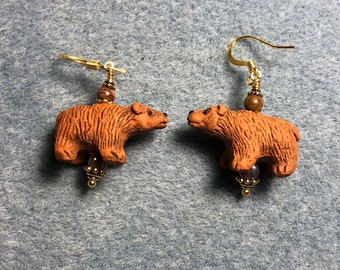 Brown ceramic bear bead earrings adorned with brown Czech glass beads.