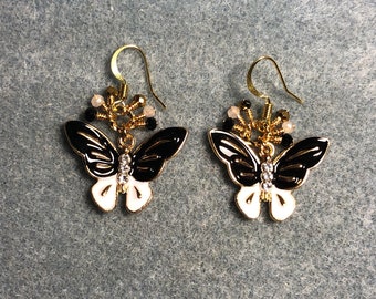 Black and white enamel and rhinestone butterfly charm earrings adorned with tiny dangling black and white Chinese crystal beads.