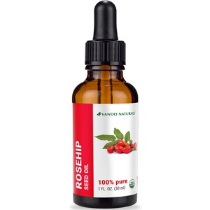 Könnte beinhalten: Eine braune Glasflasche mit Hagebuttensamenöl und einer schwarzen Pipette. Das Etikett trägt den Text "ROSEHIP SEED OIL" und "100% pure 1 FL. OZ. (30 ml)". Das Etikett zeigt auch eine Grafik von Hagebutten und Blättern.