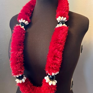MADE TO ORDER one color eyelash yarn lei segmented with black kukui nuts and cowrie shells in a variety of colors and lengths available