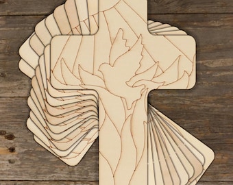 May include: A stack of wooden cross-shaped bookmarks with a laser-cut design of a dove and sun rays. The bookmarks are made of light-colored wood and have a natural finish.