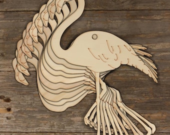 May include: A layered wooden cutout of a flamingo with a pink hue. The flamingo is standing on one leg with its other leg tucked up behind it. The cutout is made of multiple layers of wood, creating a 3D effect.