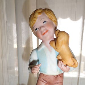 Avon 1981 “Best Friends” Young Man With Two Puppies Exclusively Handcrafted Figurine!