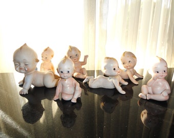 Mid Century 1950s & 1960s Lefton Set of 7 Bisque Porcelain Kewpie Doll Figurines