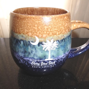 May include: A rustic wooden sign with the text "Welcome to our home" in a handwritten style. The sign is rectangular, with a distressed finish, and features a simple, inviting design. It's suitable for indoor or outdoor use.