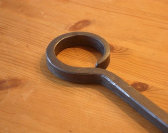 Eye Fire Poker, a simple forged fire poker, handmade by Tom Fell - Blacksmith