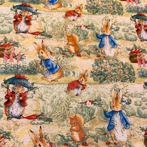 May include: A repeating pattern featuring illustrations of Peter Rabbit and squirrels in a garden setting. The rabbits wear blue jackets and red capes, while the squirrels are brown. The background is a mix of green foliage and yellow.